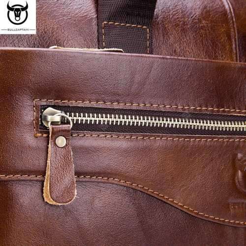**GENUINE LEATHER** Bull Captain slung business laptop bag.
