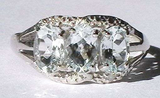 SOLID GOLD!!!  TRILOGY NATURAL MINED AQUAMARINES SET IN 10k SOLID GOLD