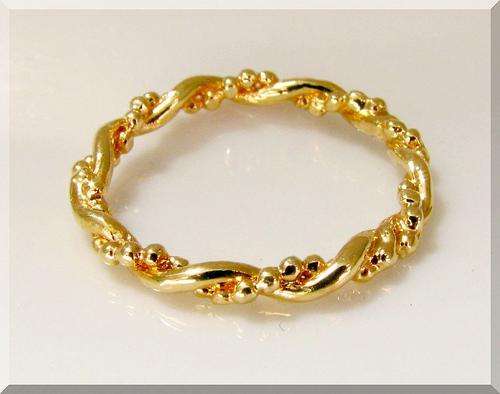 A TWIST OF GOLD! IN 18K YELLOW GOLD GP RING size 4