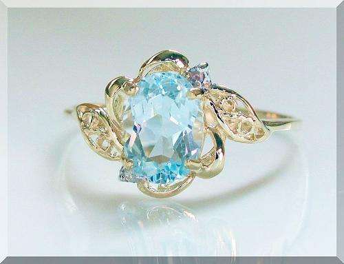 BEAUTIFUL BLUE TOPAZ  .....NATURAL  GEMS  SET IN 10k SOLID GOLD