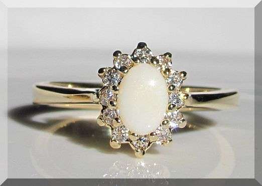 ELEGANT PRINCESS STLYE! STUNNING SIMULATED OPAL AND DIAMONDS CLAD IN 18K  GOLD size 6