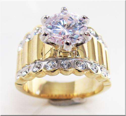 **STRIKING SIMULATED DIAMONDS  SET IN 18K GP YELLOW  GOLD  SIZE 6