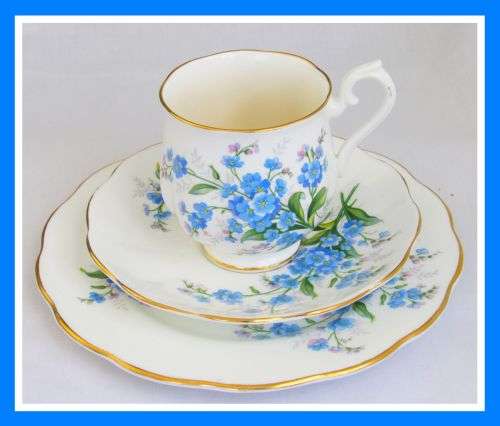 Delicate Royal Albert Demitasse Trio  with a "Forget Me Not" Pattern!