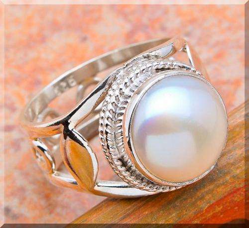 **INTERNATIONAL SHIPPING!**MAJESTIC  PEARL!!!  SET IN SOLID STERLING SILVER RING size 7