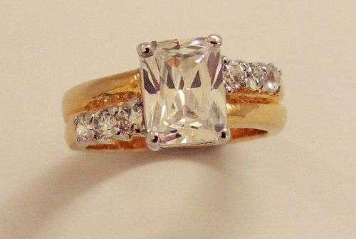 EMERALD CUT CZ DIAMOND SET IN 18K GP GOLD SZ4