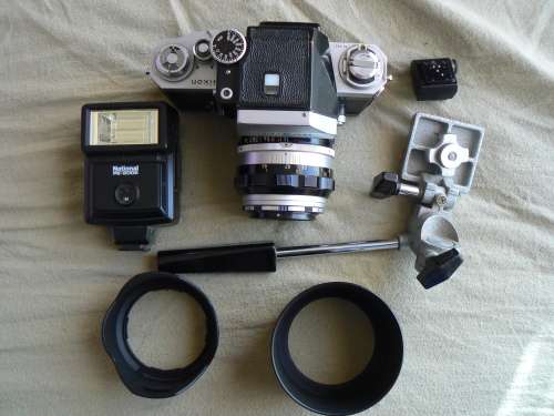 Nikon F Camera with Nikkor - S Auto 1:1.4 f=50 mm lens and exstras