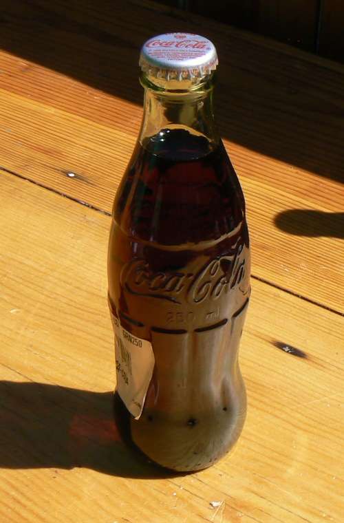 1999 -- 300 ml Coke Bottle (Full)