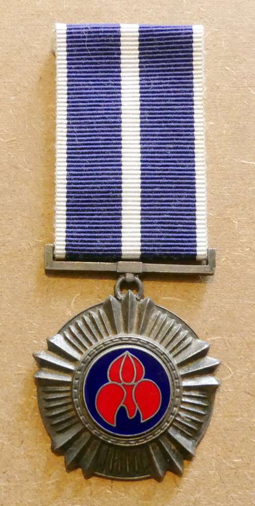 SADF -- PRO MERITO 1975 Medal with Silver marking  & numbered 523 -- Full size medal