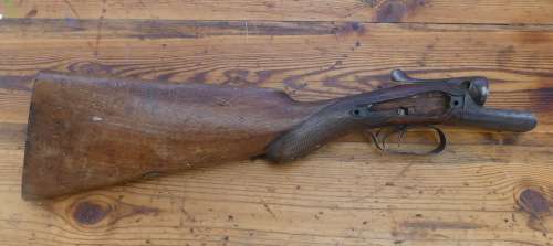 Vintage Wood stock and metal receiver on an old double barrel shotgun No 38808