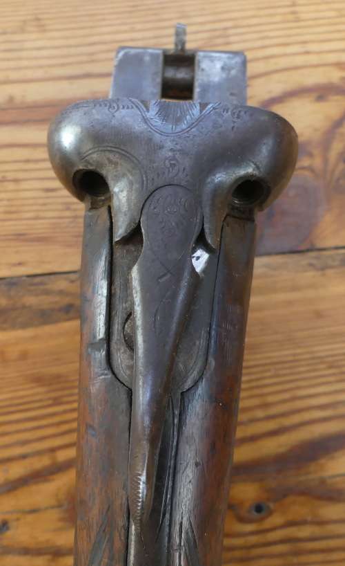 Vintage Wood stock and metal receiver on an old double barrel shotgun No 38808