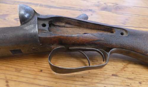 Vintage Wood stock and metal receiver on an old double barrel shotgun No 38808