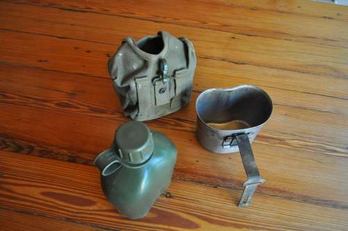 Old Army Water Bottle And Fire Bucket