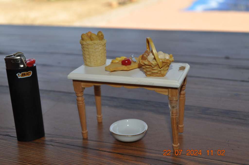 Dolls house kitchen table with extras