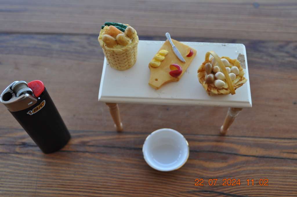 Dolls house kitchen table with extras