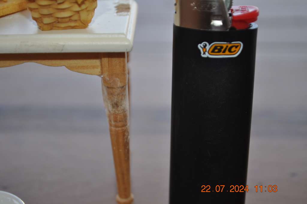 Dolls house kitchen table with extras