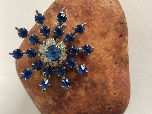 Silver Tone Snowflake Brooch With Royal Blue Stones & Flower In The Middle