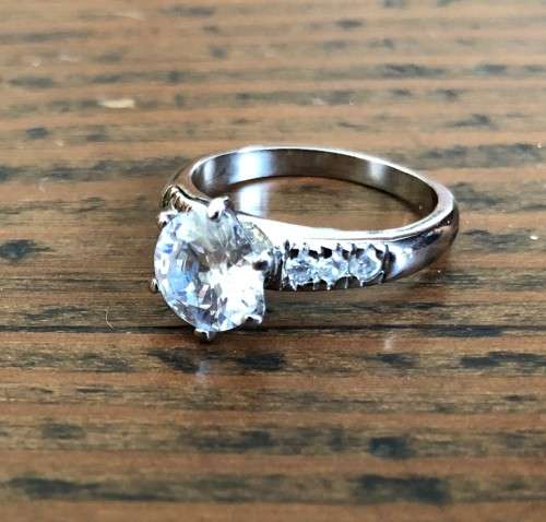 Silver Tone Fashion/Engagement Ring, White centre stone, Ring Size 0