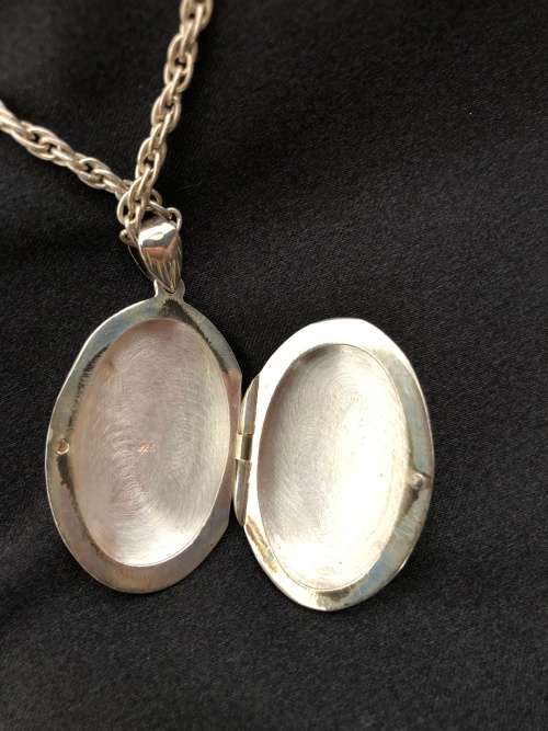 Vintage Sterling Silver Oval Locket with Chain. Can hold 2 Portraits