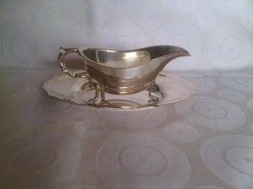 Silver plated gravy boat and stand