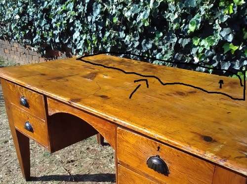 Lovely 1800`s, rustic Oregon desk / table with four drawers, cup handles and thick tapered legs.