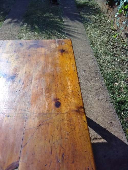 Lovely 1800`s, rustic Oregon desk / table with four drawers, cup handles and thick tapered legs.