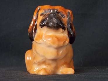 Porcelain Sitting Pekingese