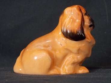 Porcelain Sitting Pekingese