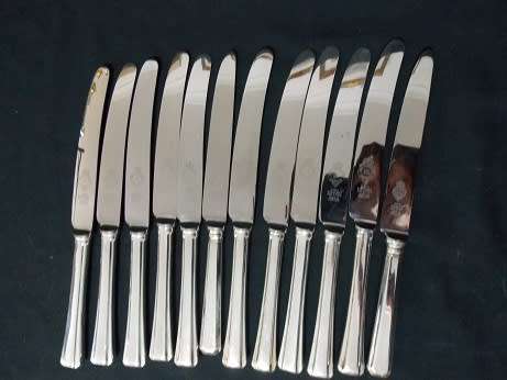 Set of Twelve Silver Plate Dinner Knives