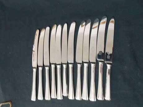 Set of Twelve Silver Plate Dinner Knives