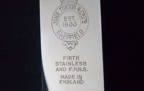 Set of Twelve Silver Plate Dinner Knives