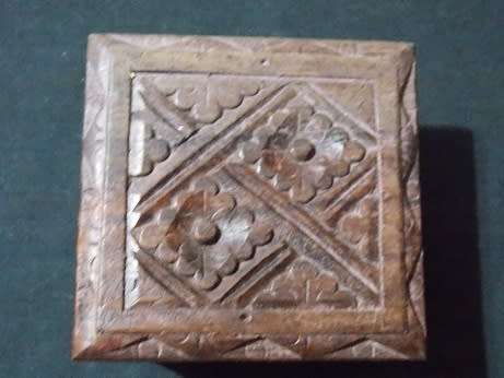 Six Small Carved Wooden Boxes