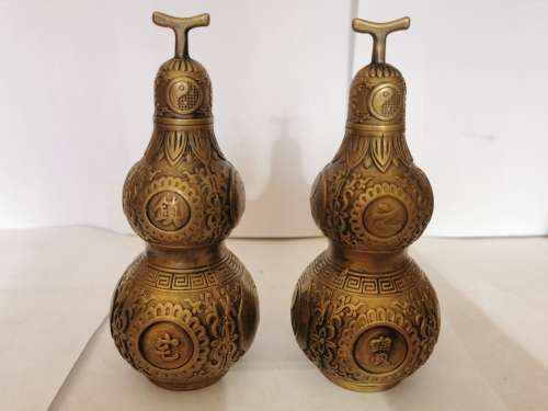 Eastern Chinese A pair of ornaments of copper gourd