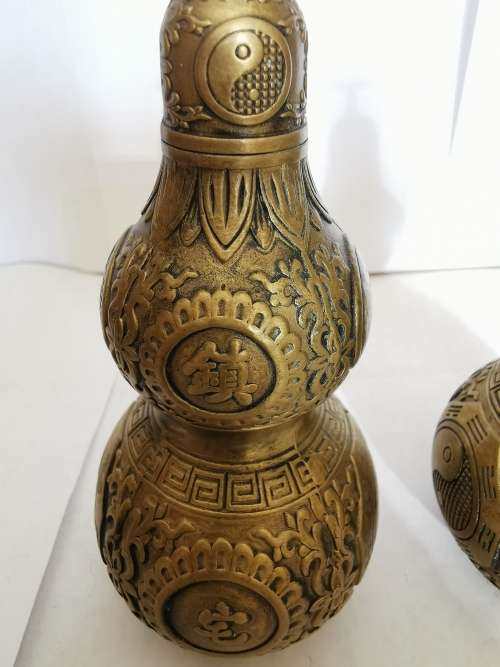 Eastern Chinese A pair of ornaments of copper gourd