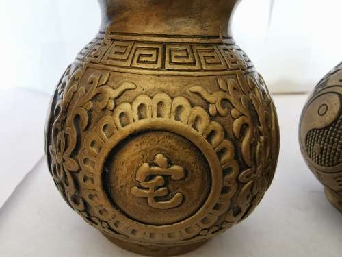 Eastern Chinese A pair of ornaments of copper gourd