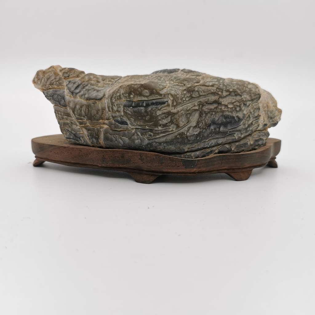 Antique Natural stone ornaments with a rosewood base