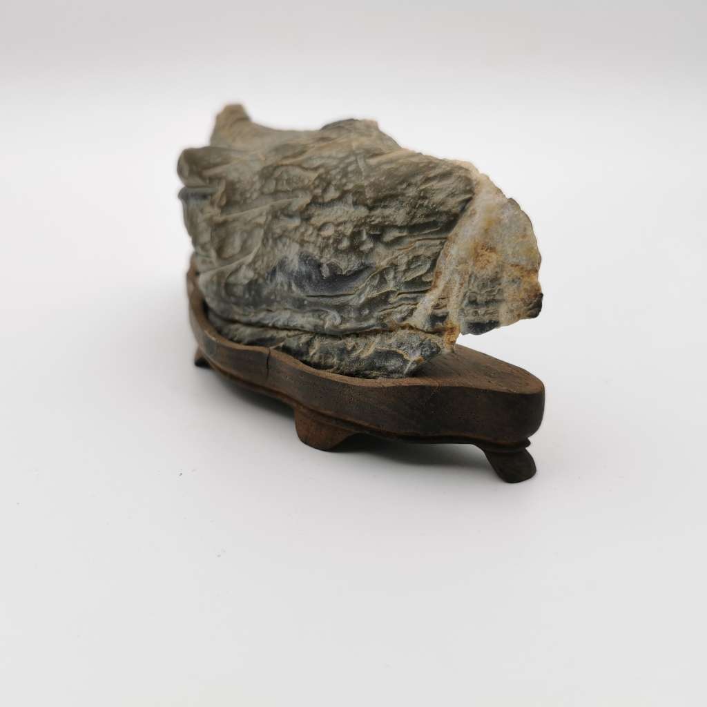 Antique Natural stone ornaments with a rosewood base