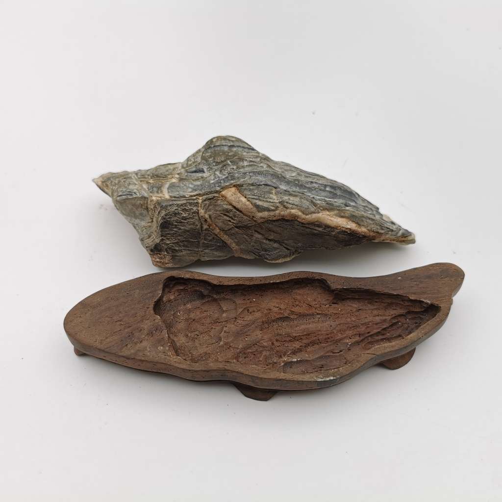 Antique Natural stone ornaments with a rosewood base