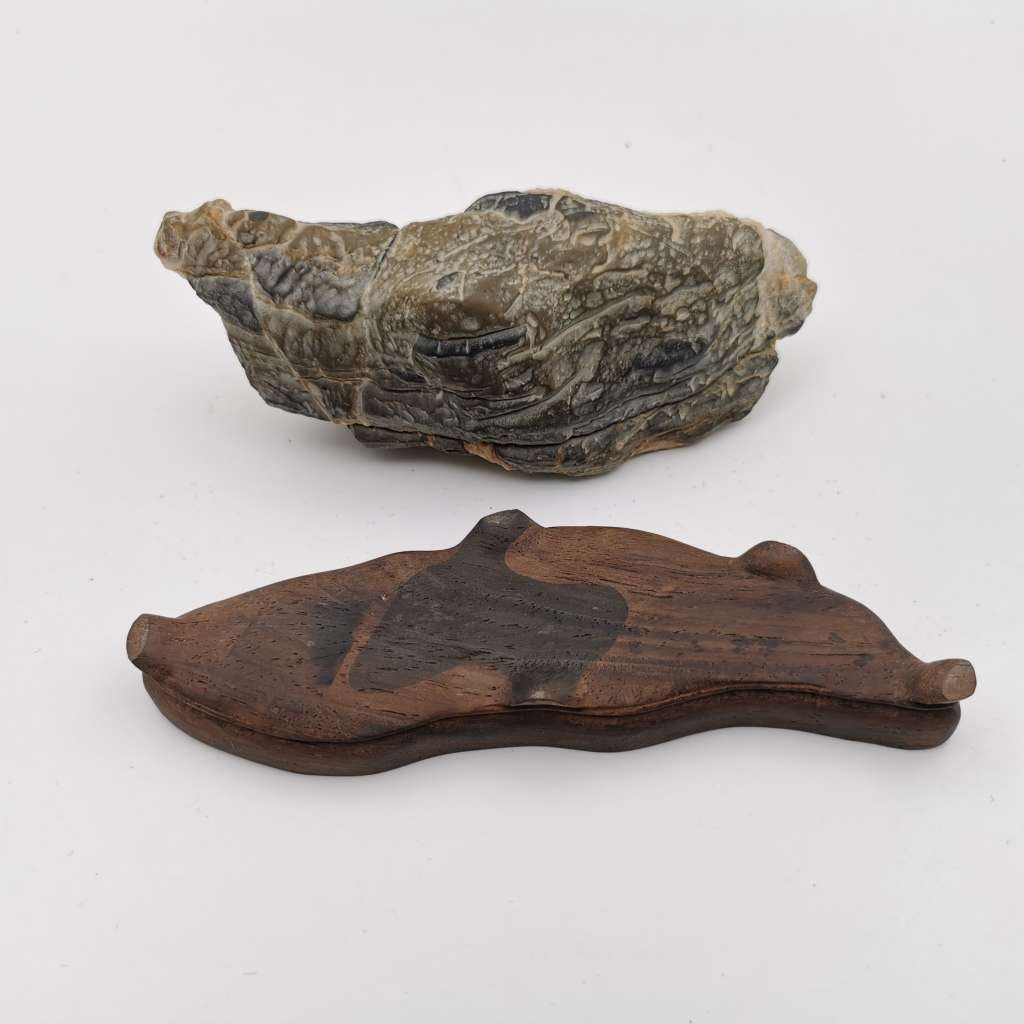 Antique Natural stone ornaments with a rosewood base