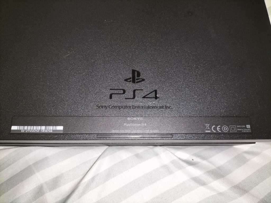 Sony PS4 500GB with 1TB HDD & Corsair Headphones