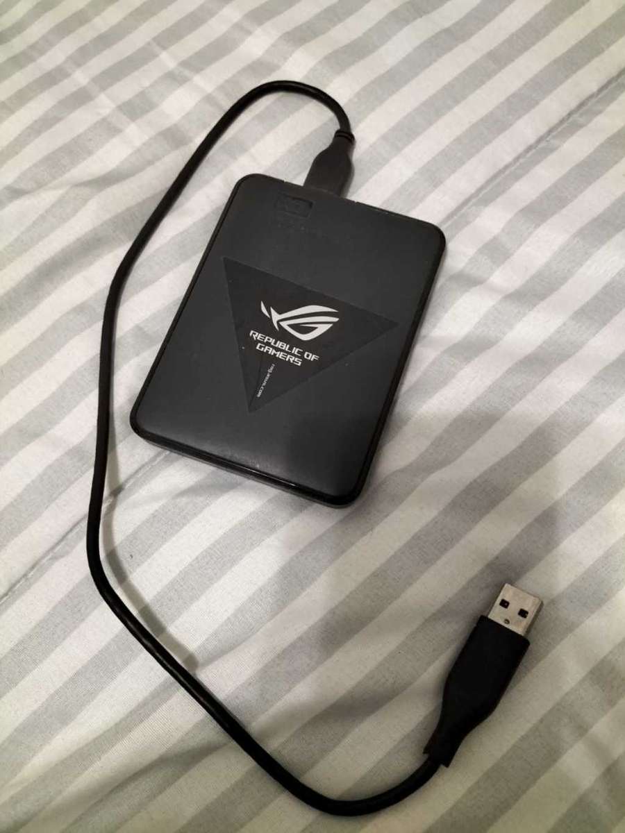 Sony PS4 500GB with 1TB HDD & Corsair Headphones