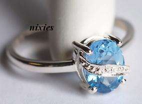 LOVELY 925 STERLING SILVER BLUE TOPAZ CZ RING - SIZE 9(S)