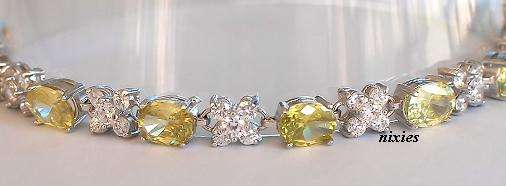 STRIKING WHITE GOLD YELLOW TOPAZ CZ TENNIS BRACELET