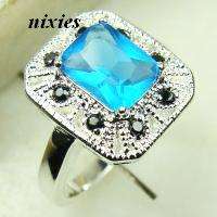 LOVELY SWISS BLUE TOPAZ IN STERLING SILVER - SIZE 7(O)