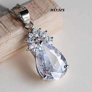 ELEGANT WHITE GOLD  WHITE TOPAZ PENDANT on chain