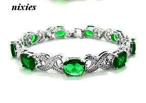 STRIKING WHITE GOLD EMERALD BRACELET