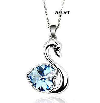 DAZZLING TANZANITE SWAROVSKI SWAN PENDANT on chain