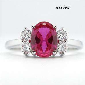 STRIKING OVAL RUBY CZ RING - SIZE 7(O)