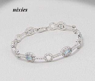 STUNNING BLUE TOPAZ & GENUINE DIAMOND BRACELET