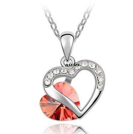 SPARKLING REDDISH SWAROVSKI HEART PENDANT  on chain
