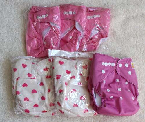12 New Cloth nappies- Bargain.